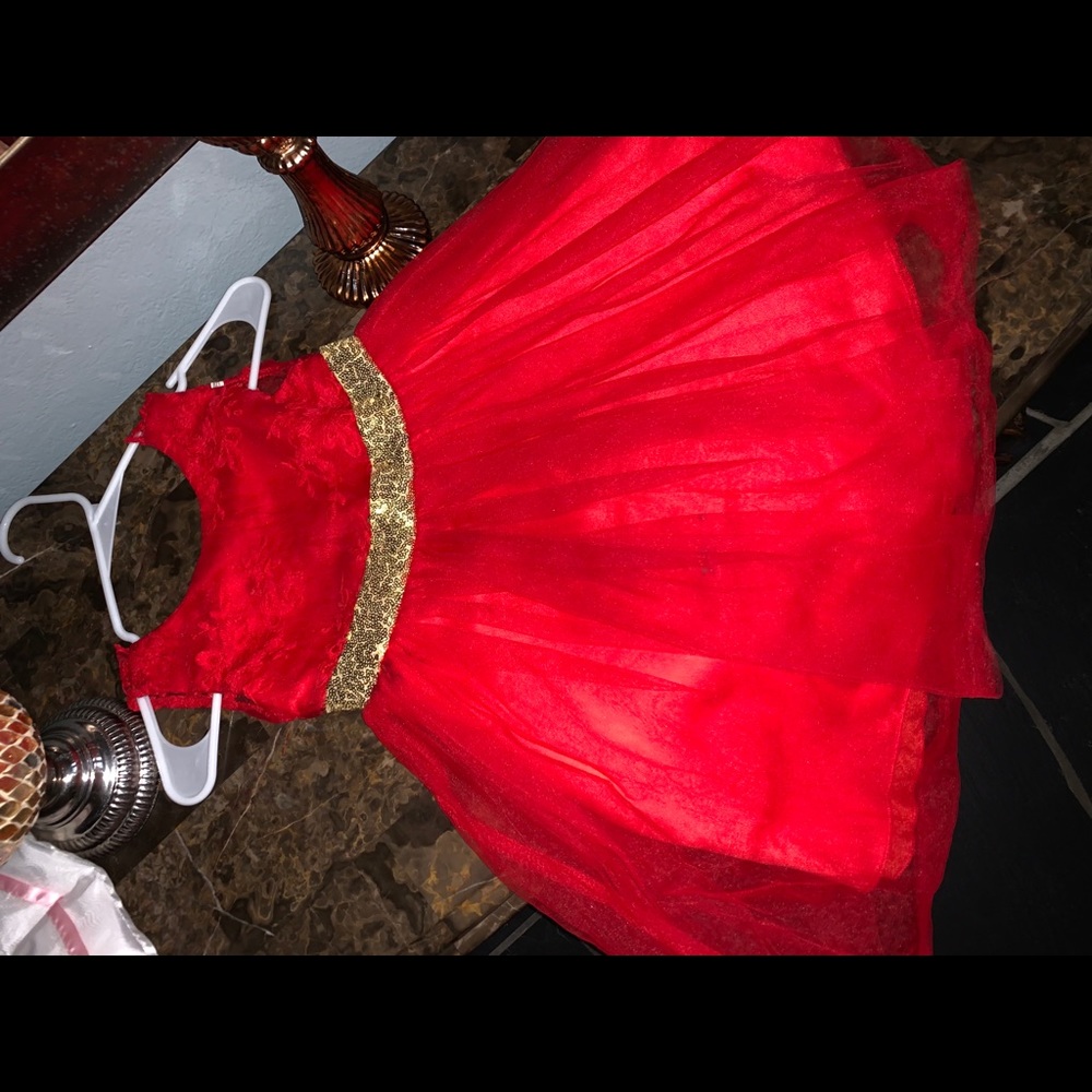 Girl’s red dress
